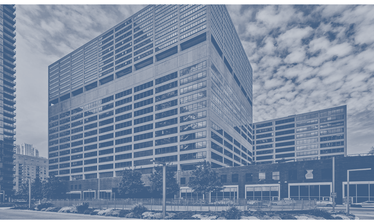 Blue duotone image of a building.